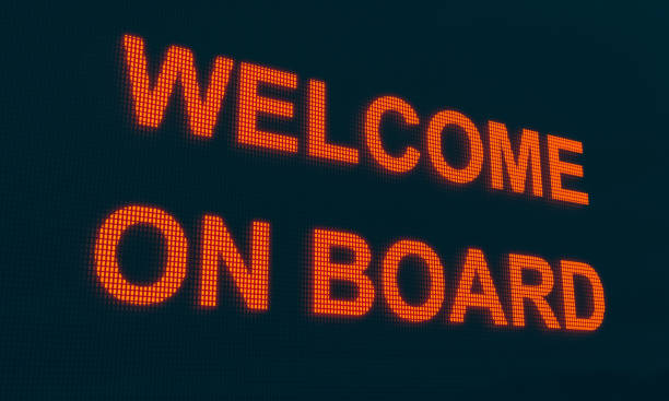 Welcome on board on a screen illuminated in orange.