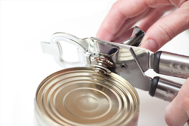 istock can with opener hand 138170294