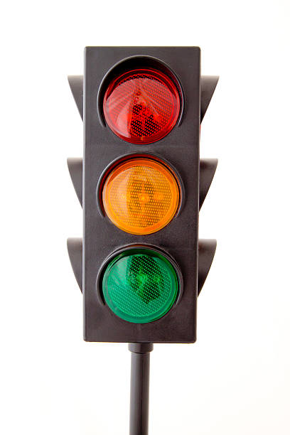 Traffic lights isolated on white background Traffic lights - toy isolated on white background stoplight stock pictures, royalty-free photos & images