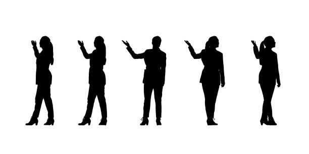 Silhouette of a business woman from multiple angles showing something with her hand. Isolated vector silhouettes stock photo