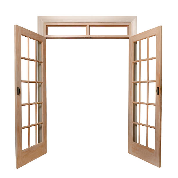Light brown French doors opening up to a white background