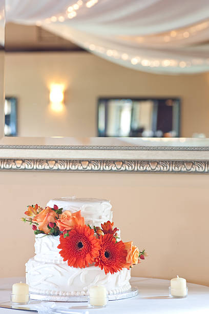 istock Simple white wedding cake with flowers 138174479