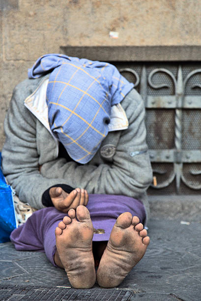 istock Woman Begging for Money on floor 138174554