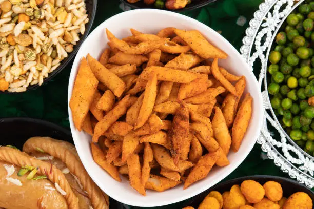 Photo of Salted Namkeen Snacks Also Called Kurkura Khasta Mathiya, Mathari, Namak Para, Shankarpali, Namkin, Matthi, Nimkin, Nimki. Food Theme For Holi, Deepawali, Rakshabandhan, Dussehra, Rakhi, Eid, Ramdan