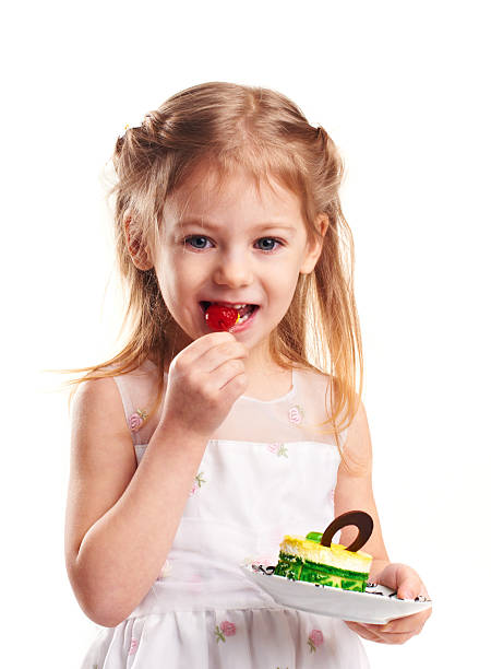 little girl with cake and cherry