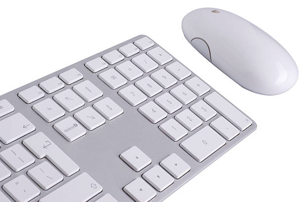 istock Keyboard and mouse isolated against white background 138175778
