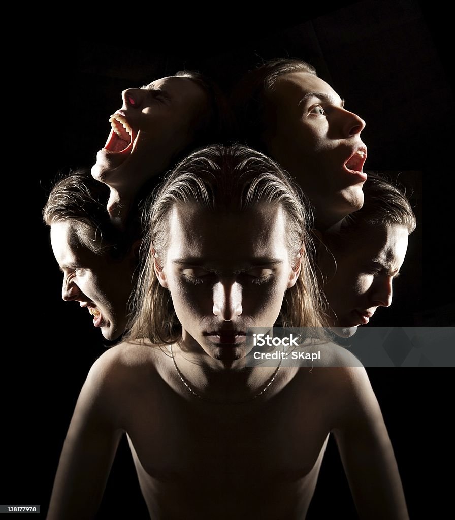 Many faces of emotions Many faces symbolizing different emotions or multiple personalities. Variation Stock Photo