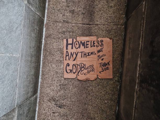 istock Homeless Sign on Cardboard 1381787131