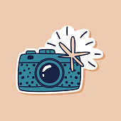 istock Drawn blue camera doodle sticker. Travel camera isolated sticker. Vector illustration 1381795300