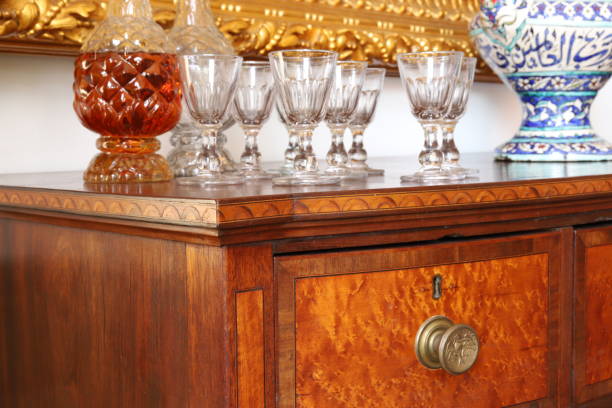 istock Antique server with antique decanters and glasses 1381795907