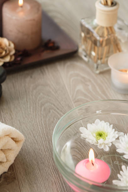 spa theme. handmade massage candles made of natural soy wax, a set of towels in pastel colors