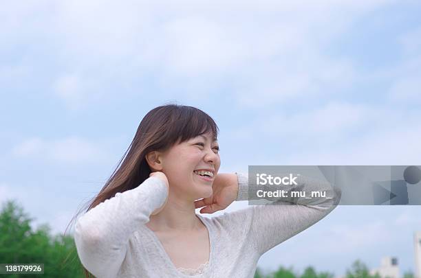 Asian Woman Combing Her Hair Stock Photo - Download Image Now - Japanese Ethnicity, Only Women, Profile View