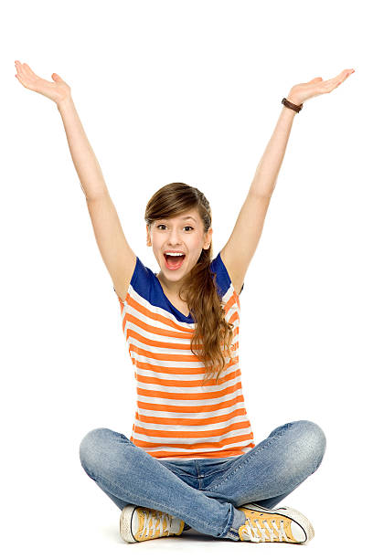 istock Woman sitting with arms raised 138186612
