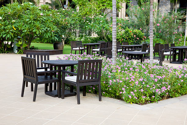 patio with table and chairs stock photo