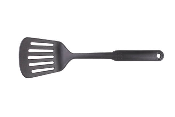 Golden carving fork isolated on white background. Barbecue accessory. 3d render