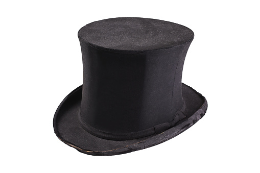 Old black in dust retro top hat isolated on white background