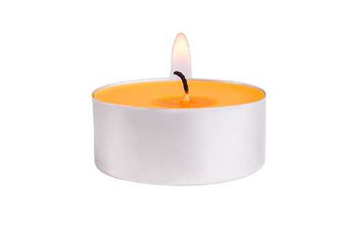 Small candle isolated on white background