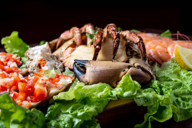 istock seafood served with salad - selective focus. 1381891434