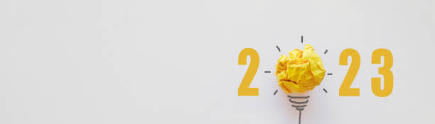 istock 2023 Yellow paper light bulb, innovative business vision and resolution concept 1381903901