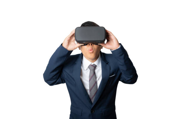 istock Studio portrait man wearing VR Headset isolated on white background. 1381921102