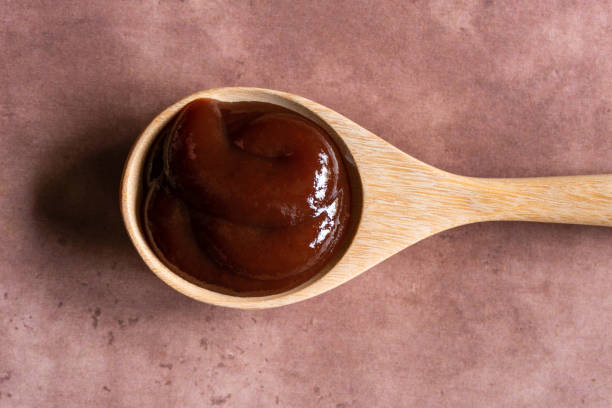 istock BBQ Sauce on a Wood Spoon 1381924453