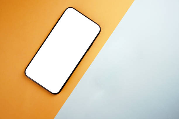 istock Overhead phone mockup with white screen and copy space 1381929129