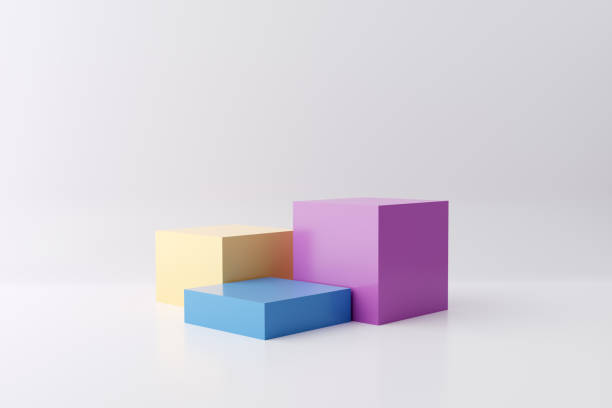 istock Pastel colored pedestals or platforms in cube shape with white studio background for product display. 1381973490