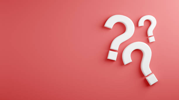 istock Three question mark symbols on pink background. Problem, dilemma or confusion 1381985539