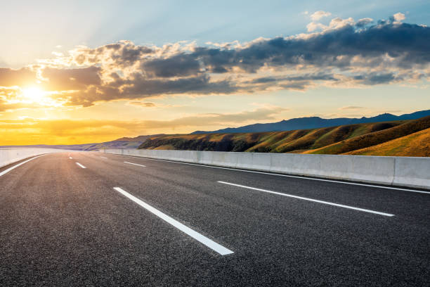 istock Asphalt road and beautiful mountain nature scenery 1381989600