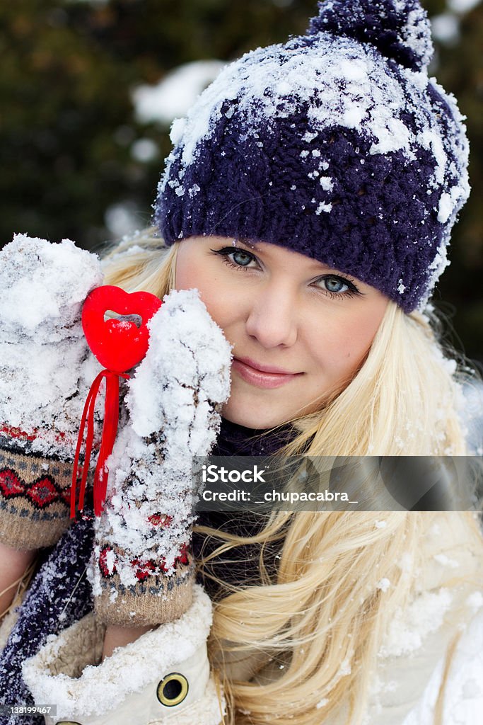 winter girl Happy winter girl with the red heart 16-17 Years Stock Photo