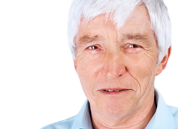 istock Closeup of an elderly man against white 138203296