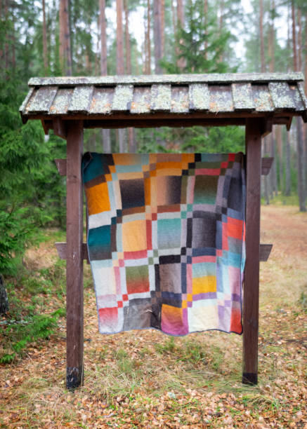 istock beautiful colored wool knitted blanket, knitting as a hobby 1382033312