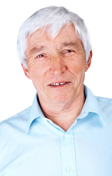 istock Closeup of a retired old man smiling against white 138203772