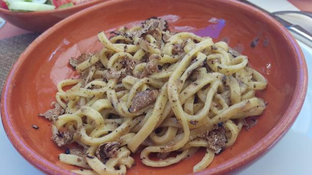 Tuscany Italy Dinner Lunch - Pici with Truffle stock photo