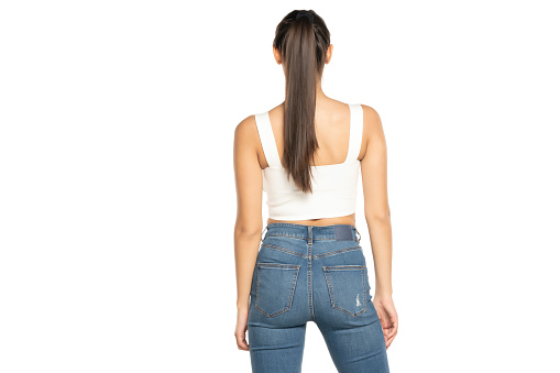 rear view of a young beautiful woman with  ponytail on a white background