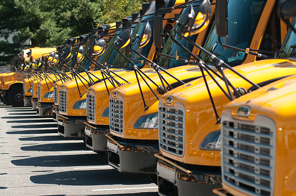 istock Row of yellow school buses 138205023