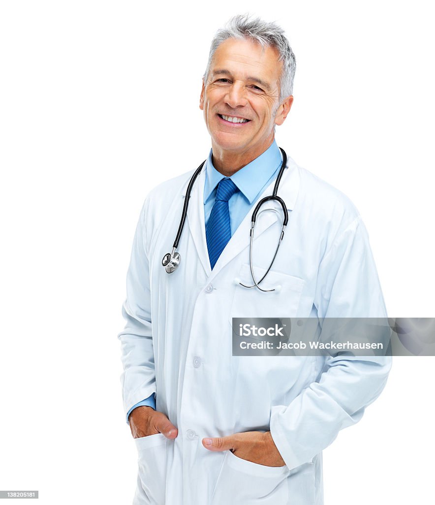 Friendly family doctor Portrait of friendly doctor smiling isolated against white background Hands In Pockets Stock Photo