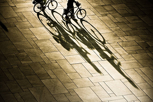 istock Bicycles sillhouettes at sunset 138208161