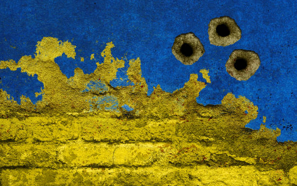 Ukrainian colors on damaged wall stock photo