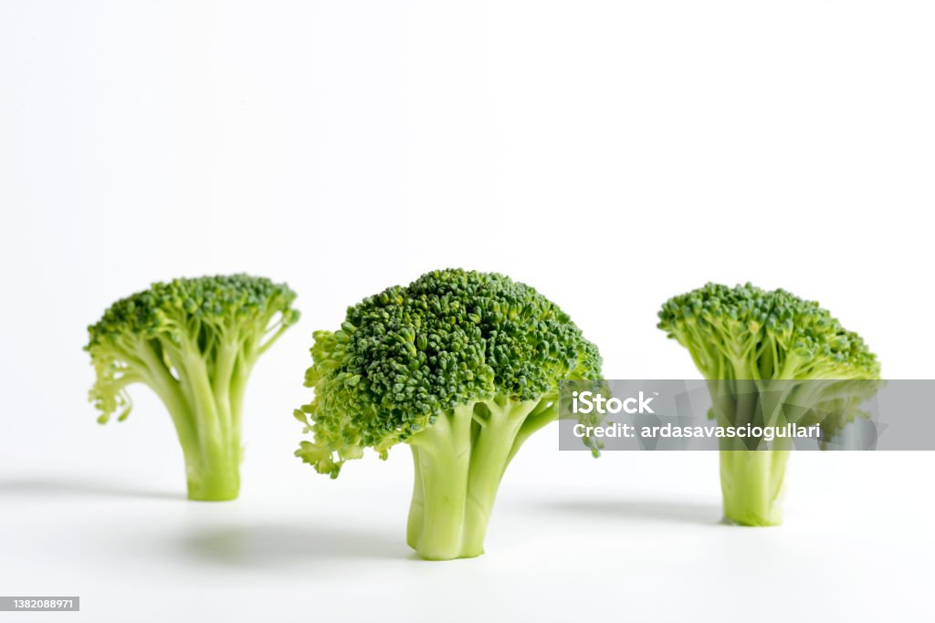 Three Broccoli Three Sliced Broccoli On A White Background Stock Photo - Download ...