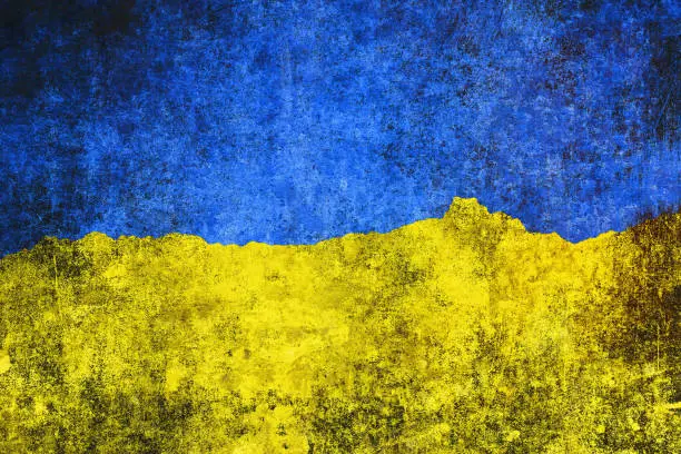 Photo of Ukrainian colors on damaged wall