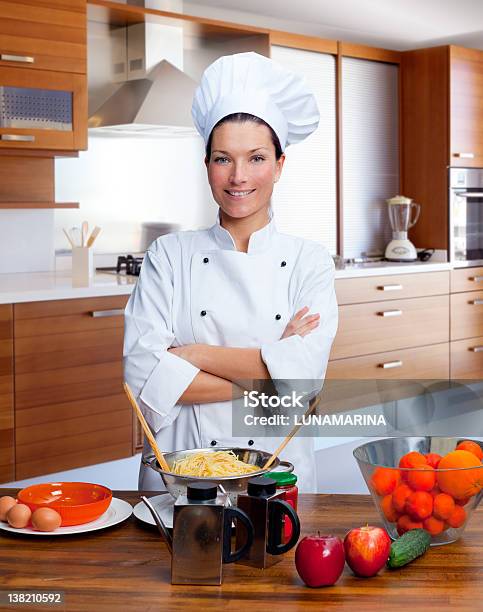 Chef Woman Portrait In The Kitchen Stock Photo - Download Image Now - 20-29 Years, 25-29 Years, Adult