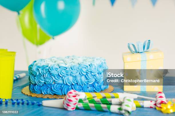 Blue Birthday Cake Stock Photo - Download Image Now - Birthday, Decoration, Party Horn Blower