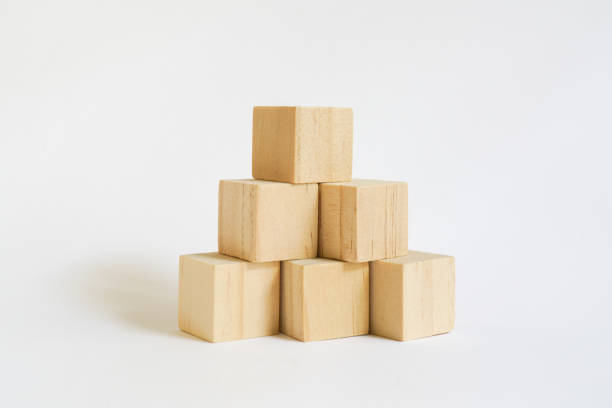 istock pyramid blank wooden block isolated on white background for graphic resource element of banner design  concept included clipping path 1382125453