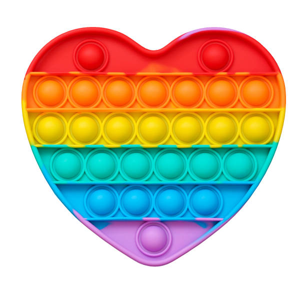 istock Rainbow Pop in the shape of a heart, isolated on a white background 1382128425