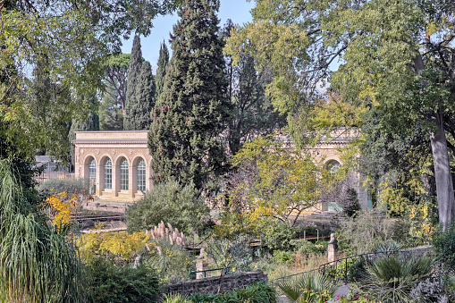 View of the Jardin des plantes, a public botanical garden (no admission fee) and an Orangery in Montpellier, France.