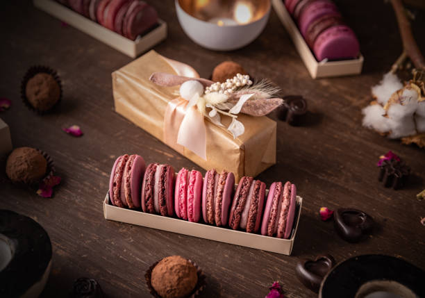 istock Sweet gift box of pink macarons 1382140477
