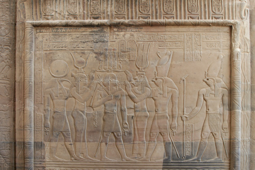 A fantastic relief depicting Ptolemy XII being presented to Horus by Isis and Raettawy.