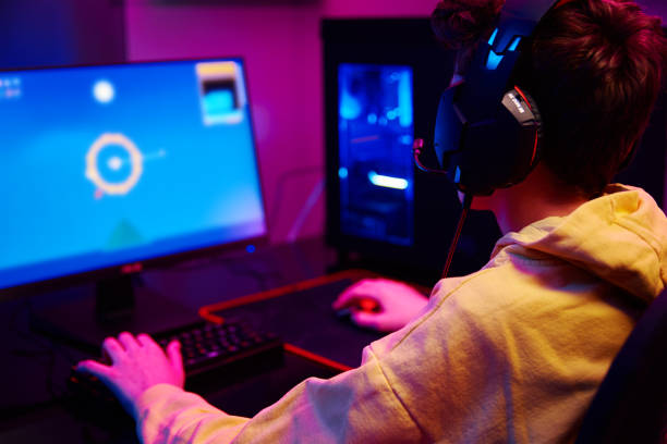 istock Boy plays computer game at home, gaming addiction 1382149928