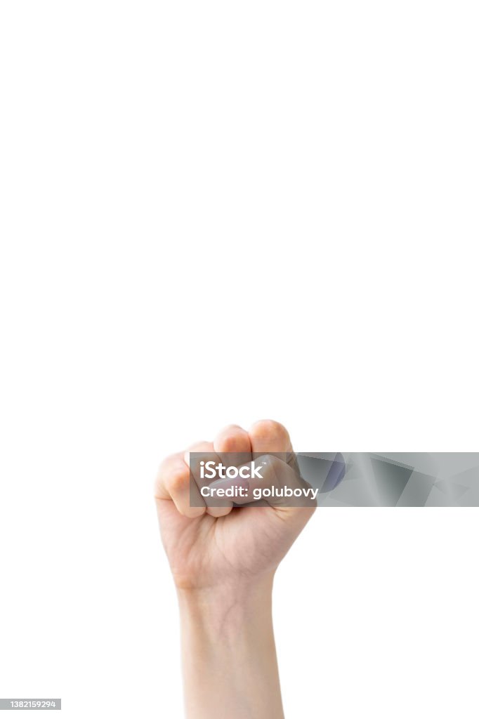 protest fist solidarity gesture clenched hand Protest fist. Solidarity gesture. Revolution power. Rebellion freedom. Female raised clenched hand striking isolated on white copy space background. Fist Stock Photo